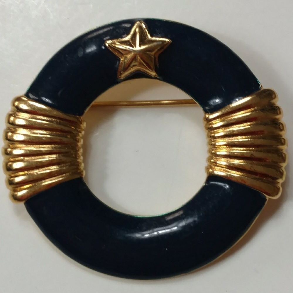 Vintage Monet navy and gold tone circle pin